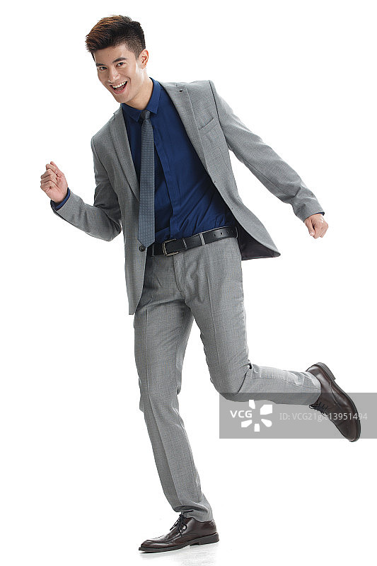 商务青年男人奔跑图片素材