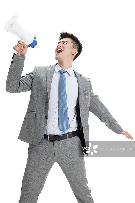 商务青年男人拿着扩音器呼喊图片素材