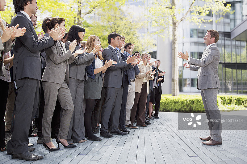 商务人士为商人欢呼图片素材