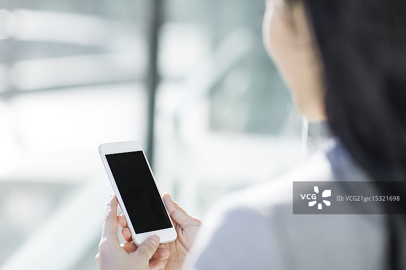 商务女士使用手机图片素材