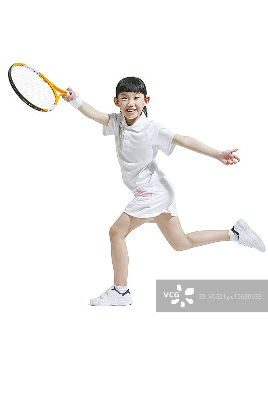 可爱的小女孩打网球图片素材