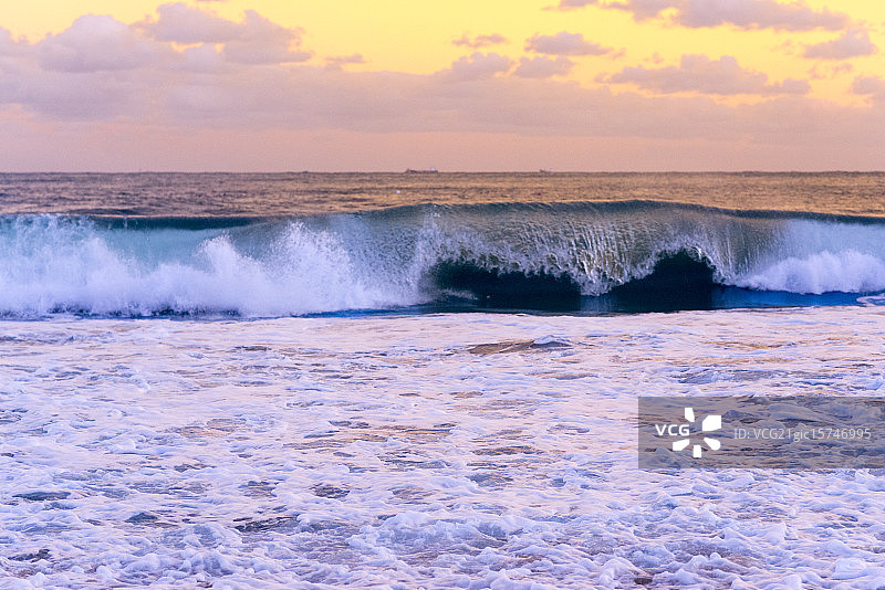 海云台晚霞与波浪图片素材