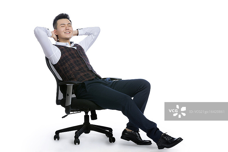 坐在椅子上休息的商务男士图片素材