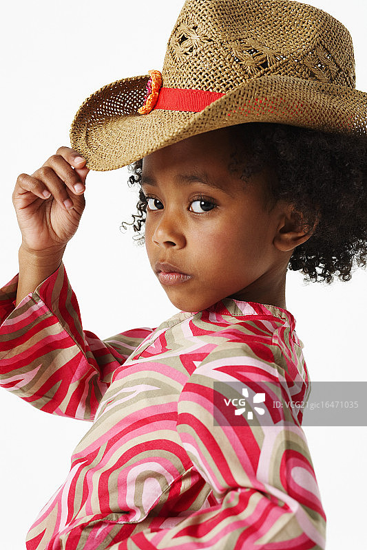 戴着牛仔草帽的年轻女孩图片素材