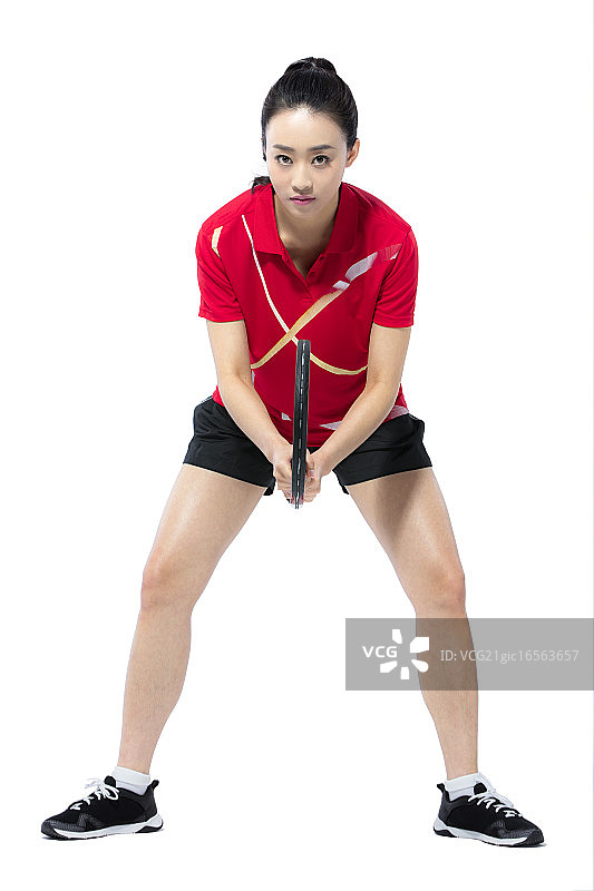 打羽毛球的女运动员图片素材