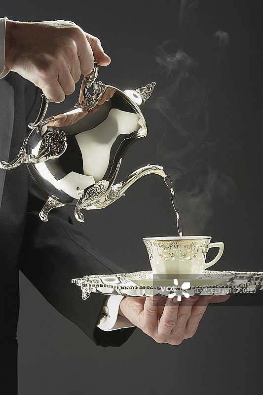 服务员倒茶图片素材