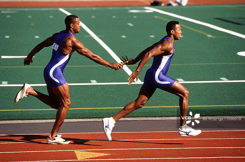 接力赛跑者交接棒图片素材