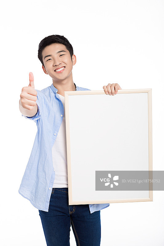 男孩拿着写字板图片素材