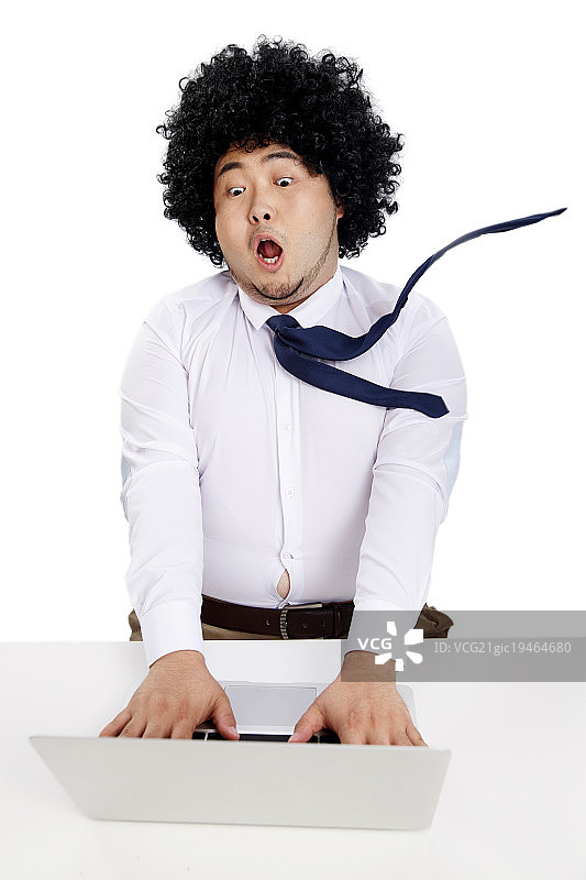 商务胖男人使用电脑图片素材