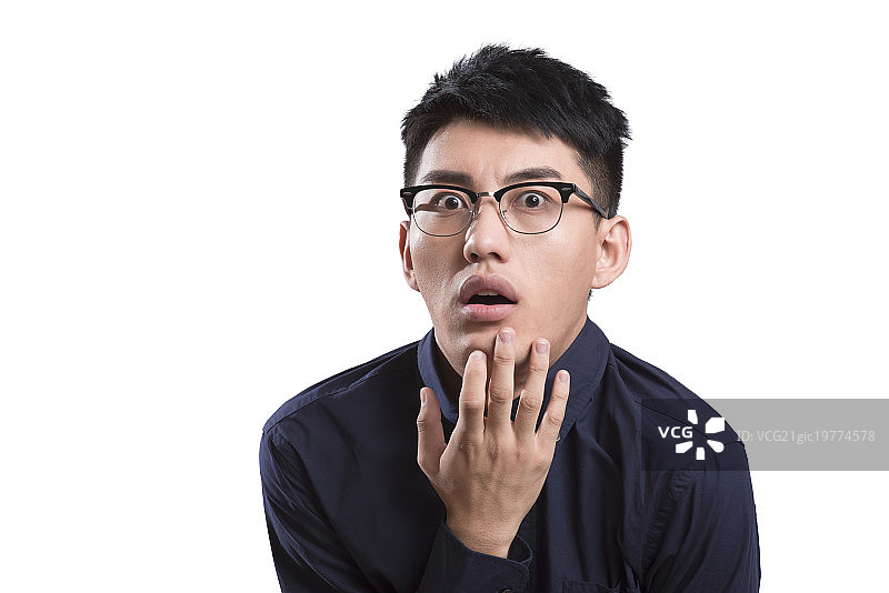 Portrait of young man scared图片素材