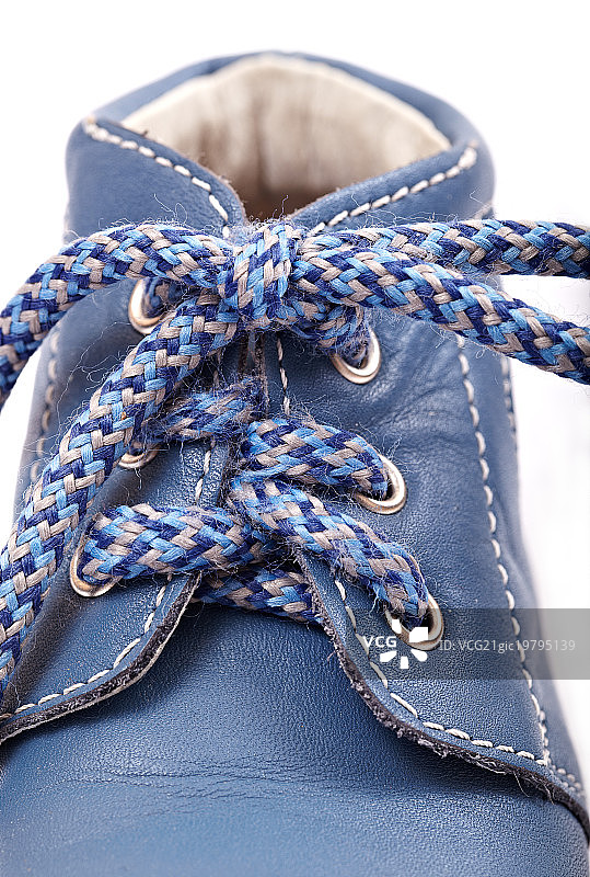 旧蓝色婴儿鞋图片素材