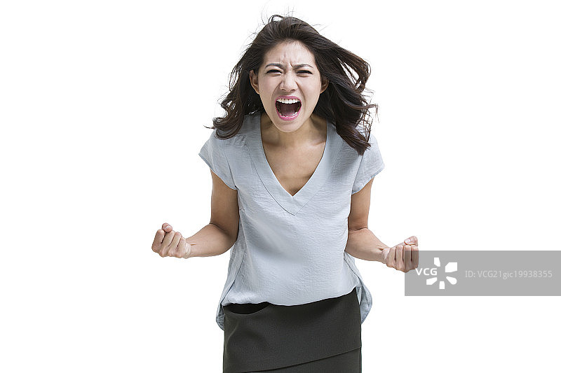 年轻女子怒吼图片素材
