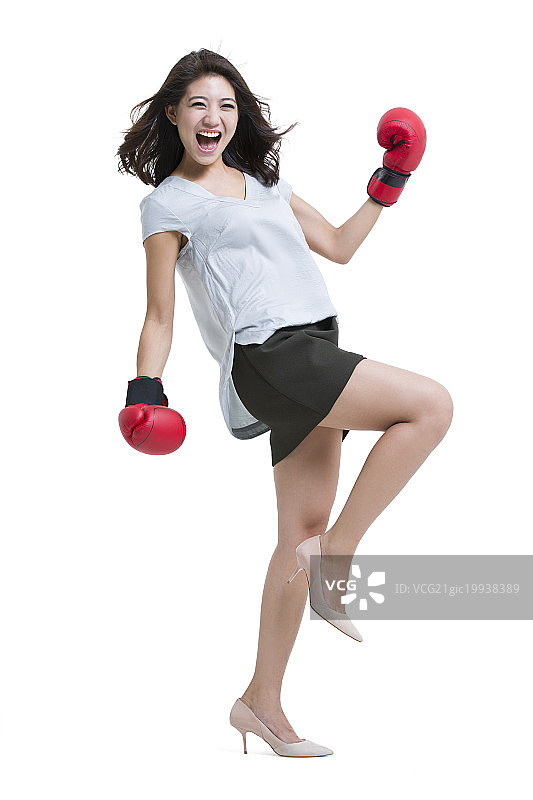 年轻女子拳击获胜图片素材