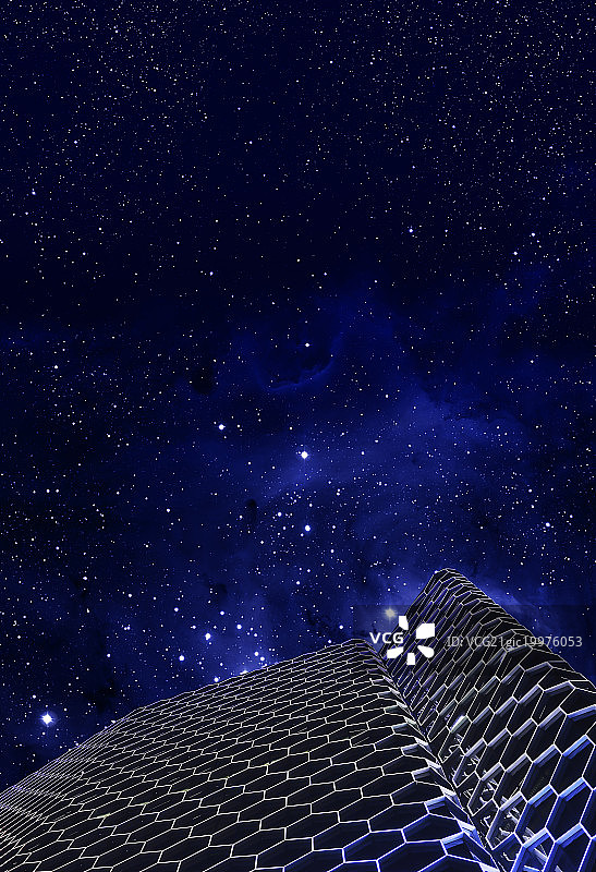 奇幻星空下的低视角摩天大楼图片素材