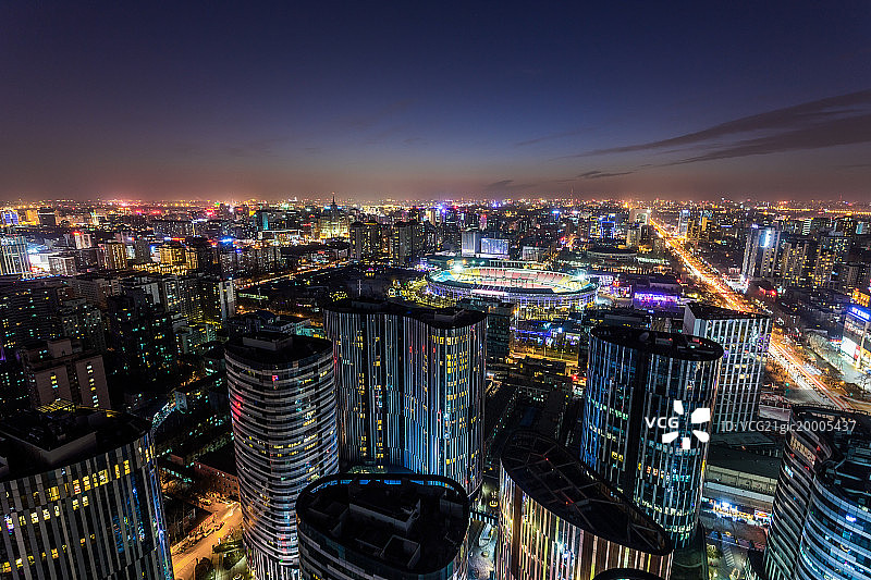 北京工人体育场和三里屯soho夜景图片素材