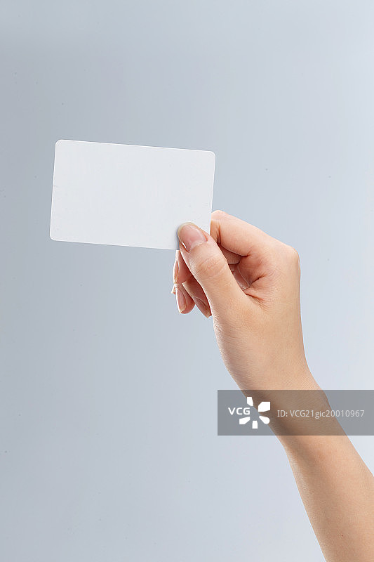手拿卡片图片素材