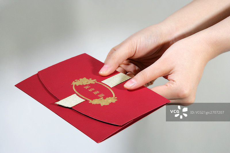 手拿贺卡图片素材