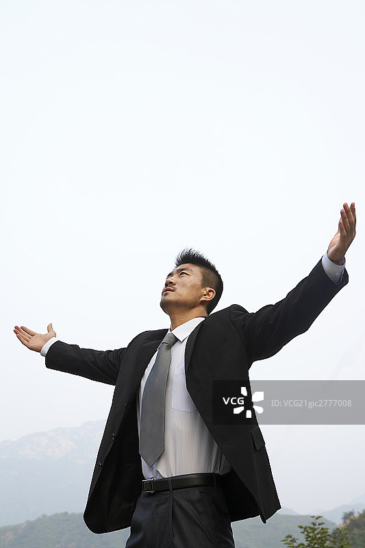高峰上商务人士图片素材