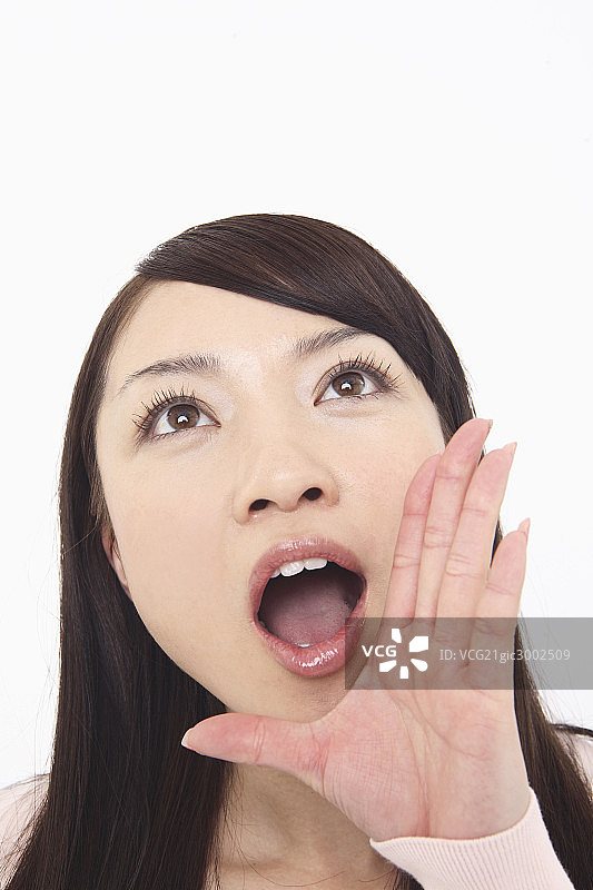 亚洲年轻女子大喊图片素材