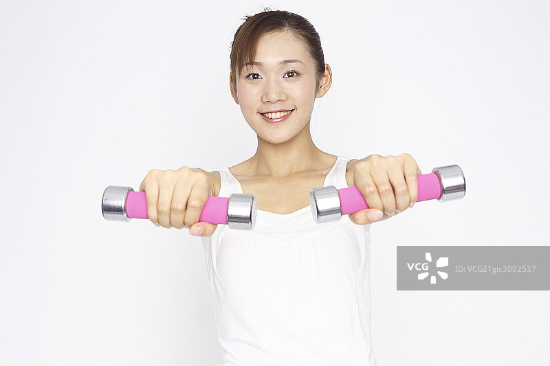 Asian woman doing exercise图片素材
