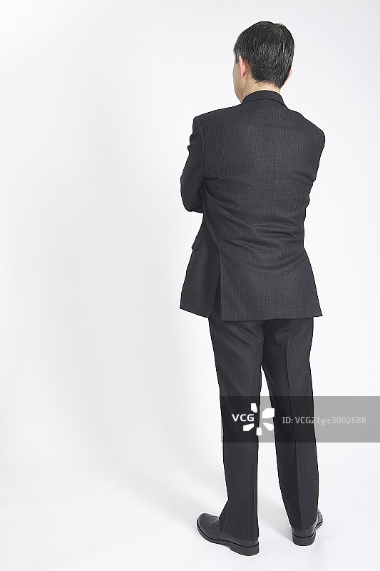 Back figure of Asian office worker图片素材