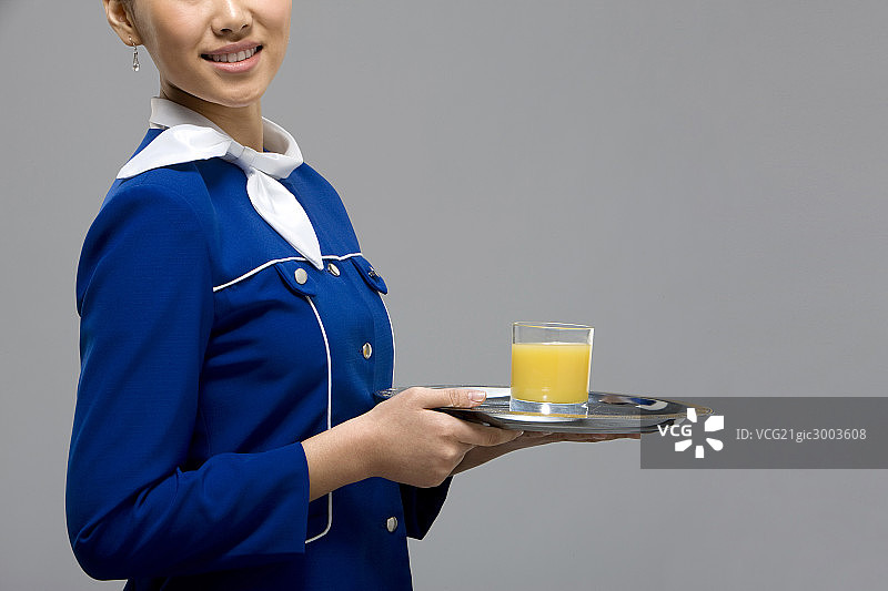 端饮料的空姐图片素材