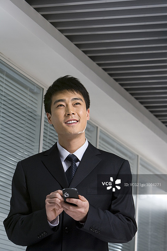 商务男士与手机图片素材