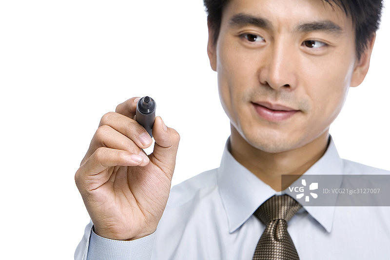 拿马克笔的商务男士图片素材