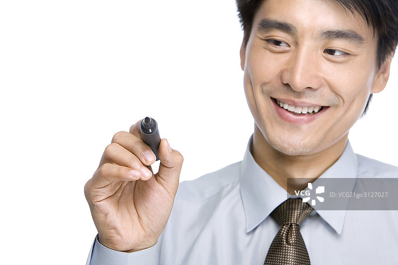 拿马克笔的商务男士图片素材