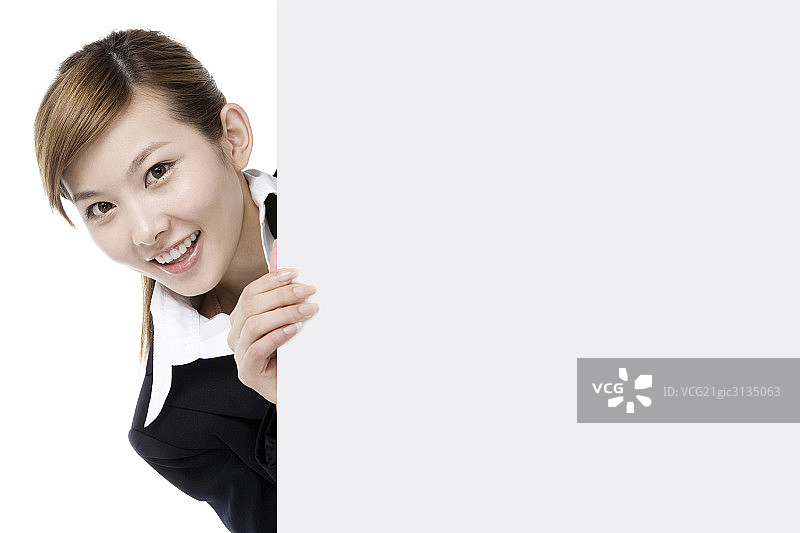 推白板的商务女士图片素材
