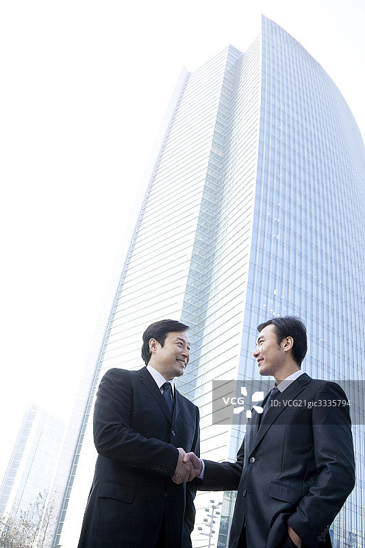 商务人士握手图片素材