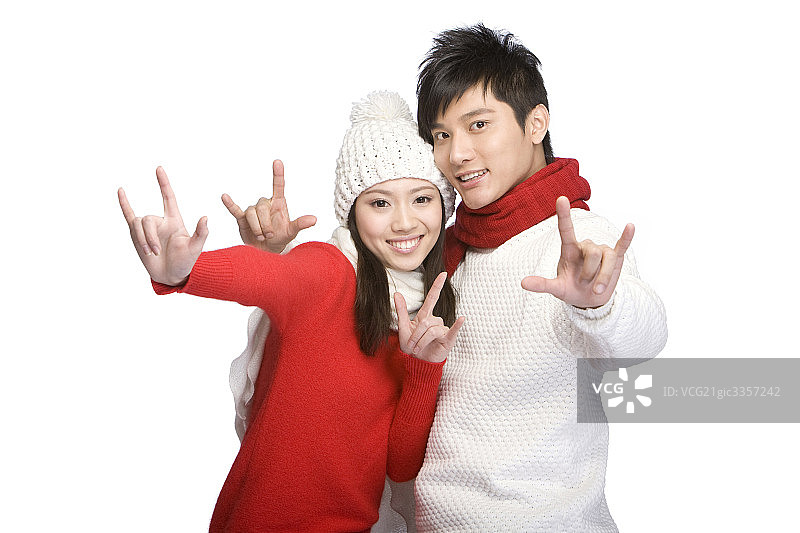 年轻夫妇做手势图片素材