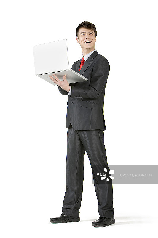 商务男士用笔记本电脑图片素材