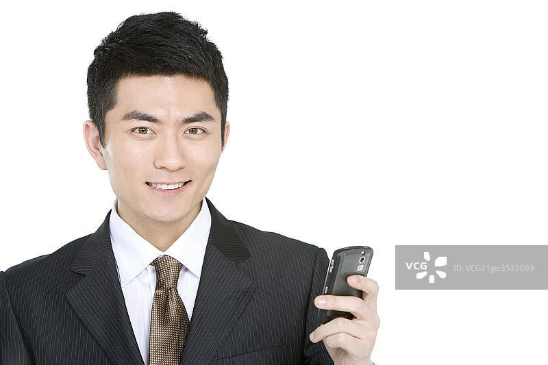 年轻商务男士和手机图片素材