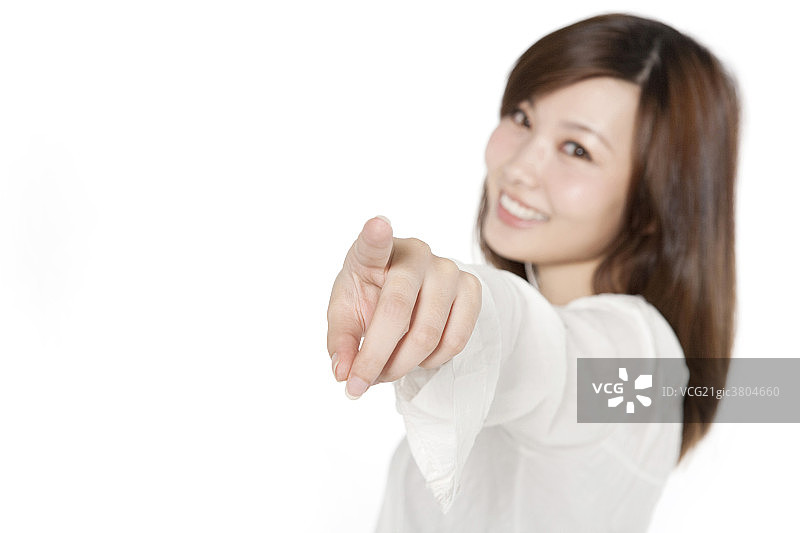 年轻女性手指前方图片素材