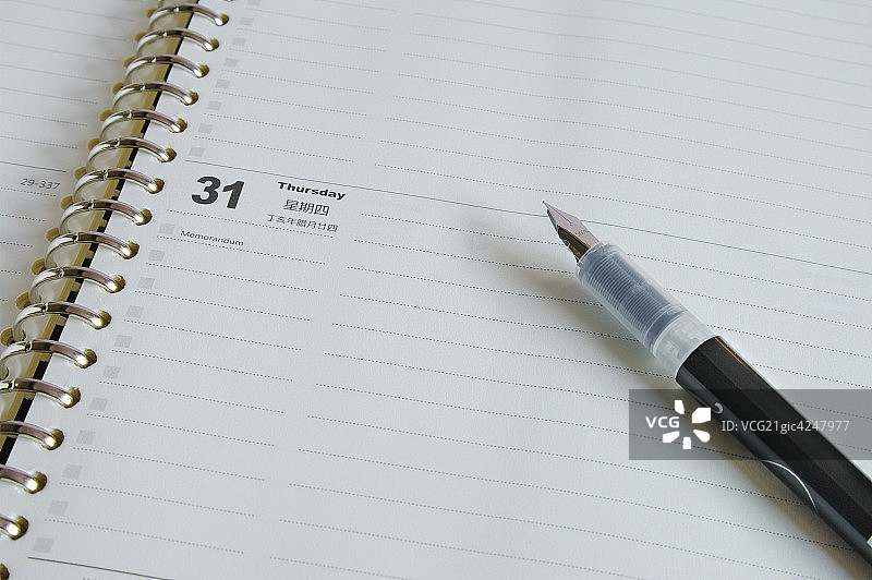 笔记本与签字笔图片素材