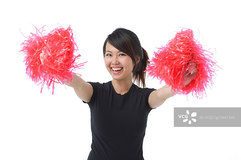 年轻女人手持啦啦球表演啦啦队图片素材