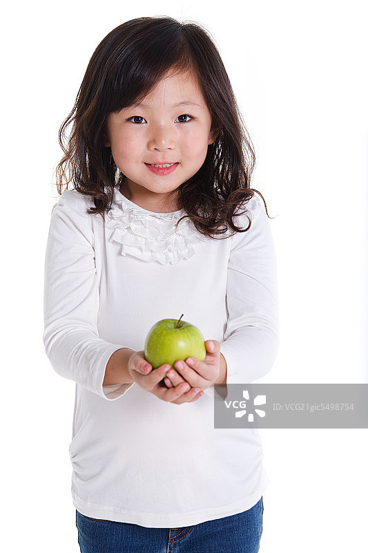 东方女孩手拿苹果图片素材