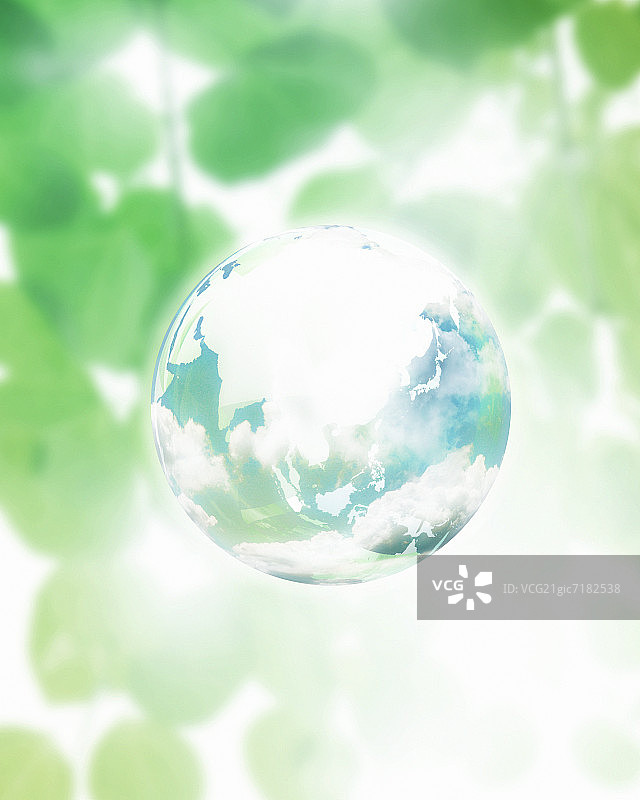 漂浮在绿叶中的地球图片素材