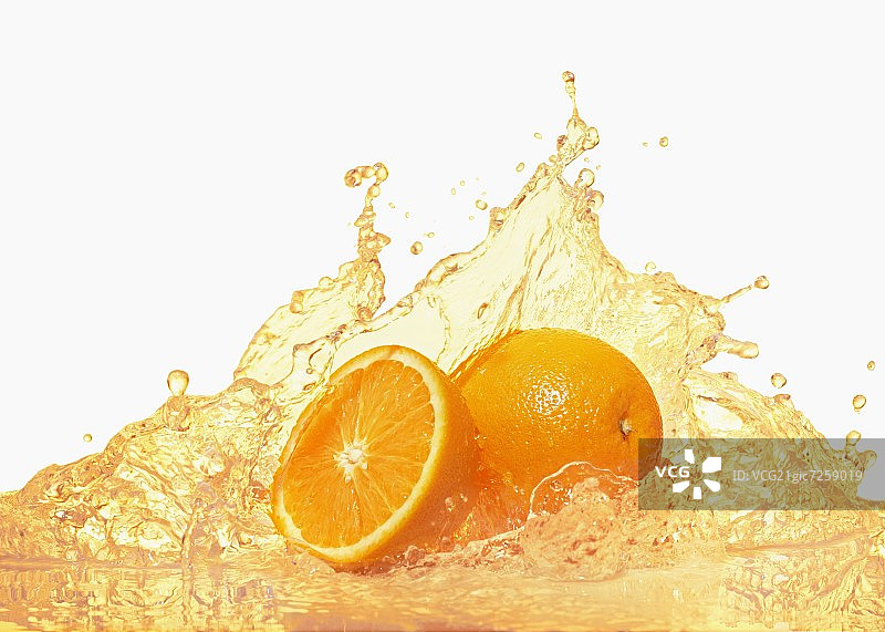 飞溅橙汁的橙子图片素材