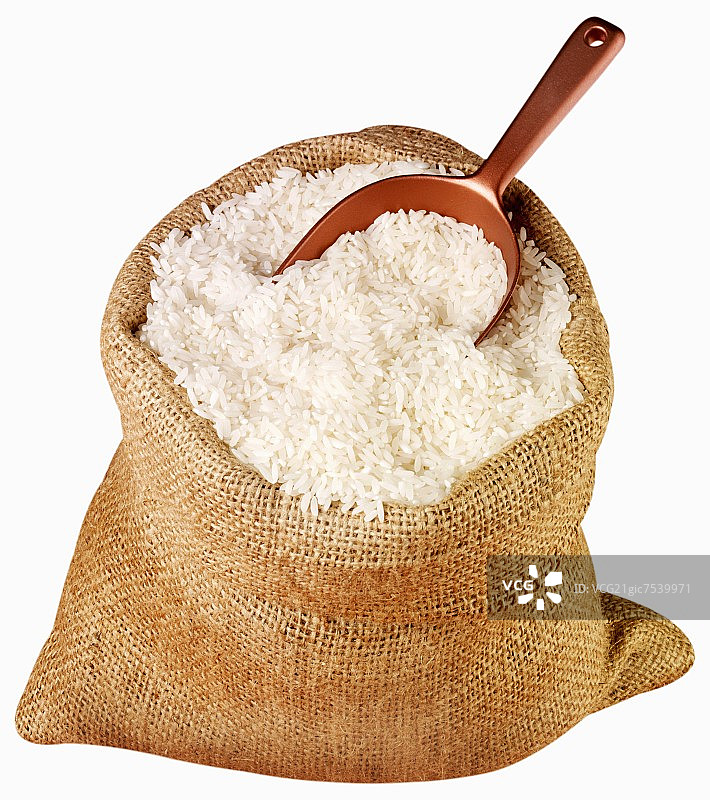 麻袋里的长粒米与勺子图片素材