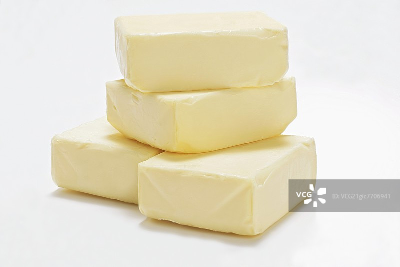 四块黄油堆放在一起图片素材