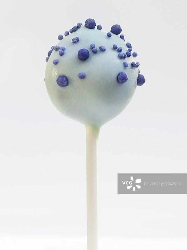 蓝色糖釉珍珠蛋糕棒棒糖图片素材