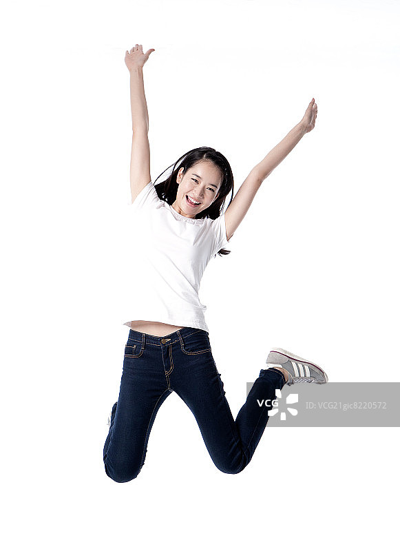 跳跃的20多岁女人图片素材