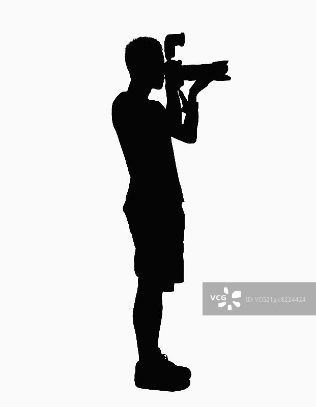 手持相机的男人剪影图片素材