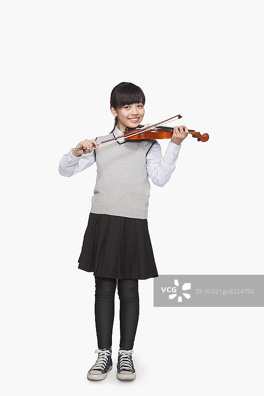 拉小提琴的女孩图片素材