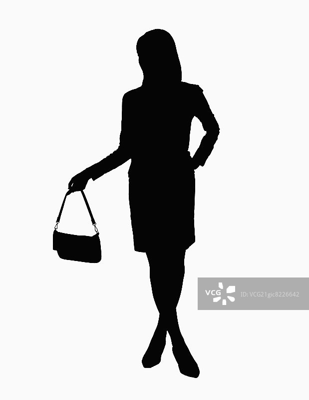 手提手提包的女商人剪影图片素材