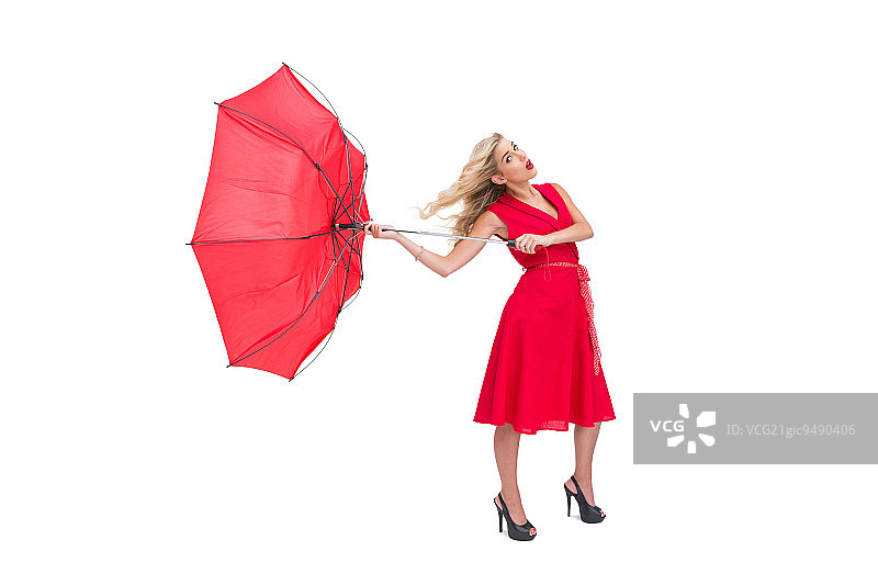 手持破伞的迷人女子图片素材