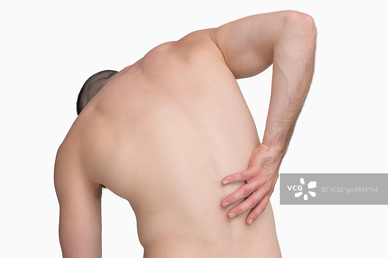 白色背景下背痛的无上衣男子背影图片素材