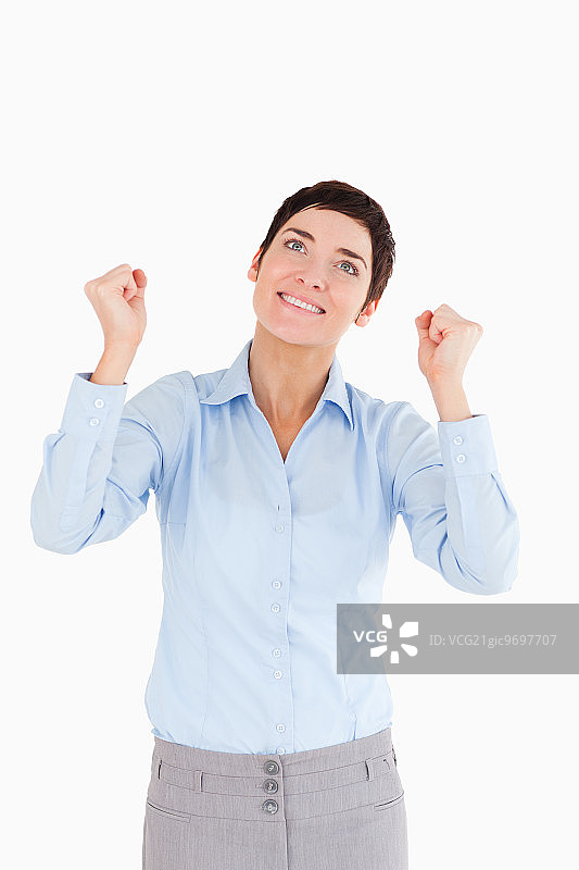 举起拳头的快乐女商人图片素材